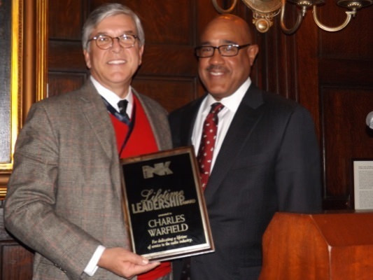 NAB President/CEO Gordon Smith (l) poses with Charles Warfield, who was honored with the 2014 Radio Ink Lifetime Leadership Award.