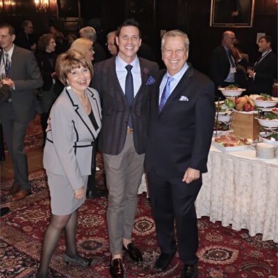 Jay Bailey, CEO of Forecast Gold and Silver Sponsor Sun Broadcast Group, smiles with Radio Ink's Deborah Parenti and Eric Rhoads.